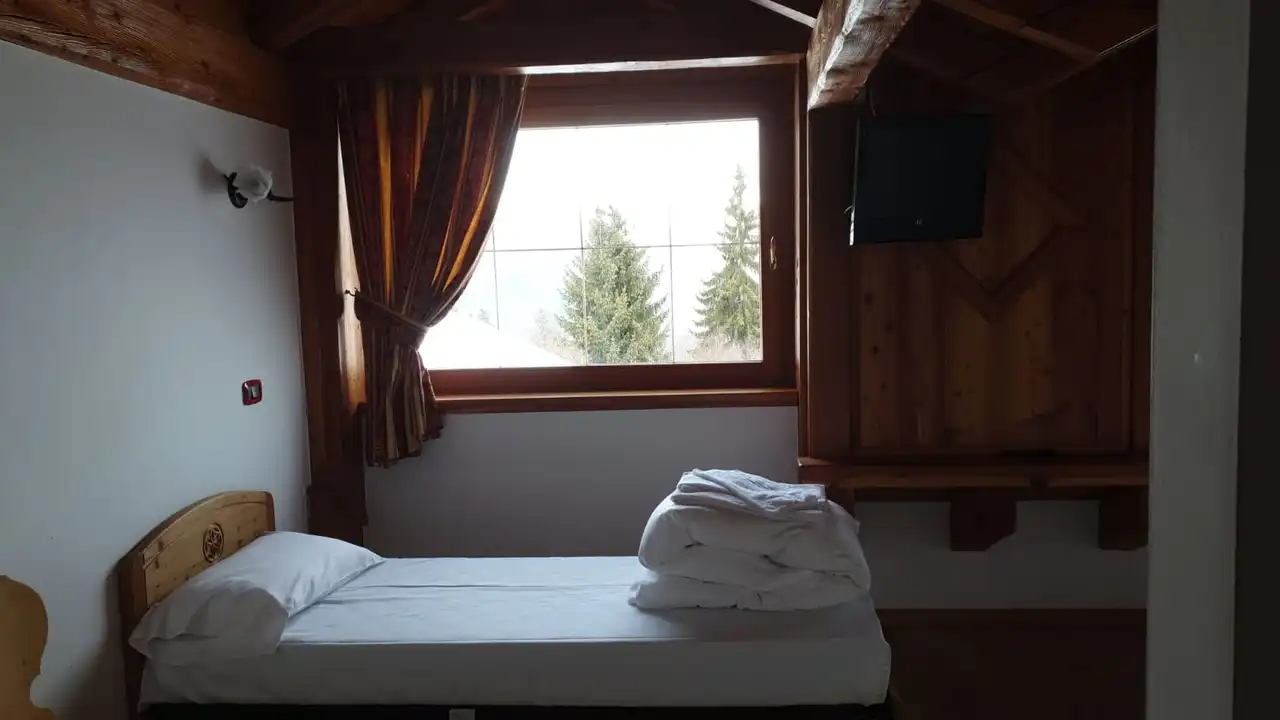 Camera Quadrupla: Fino a 4 posti letto, per famiglie e gruppi di amici.